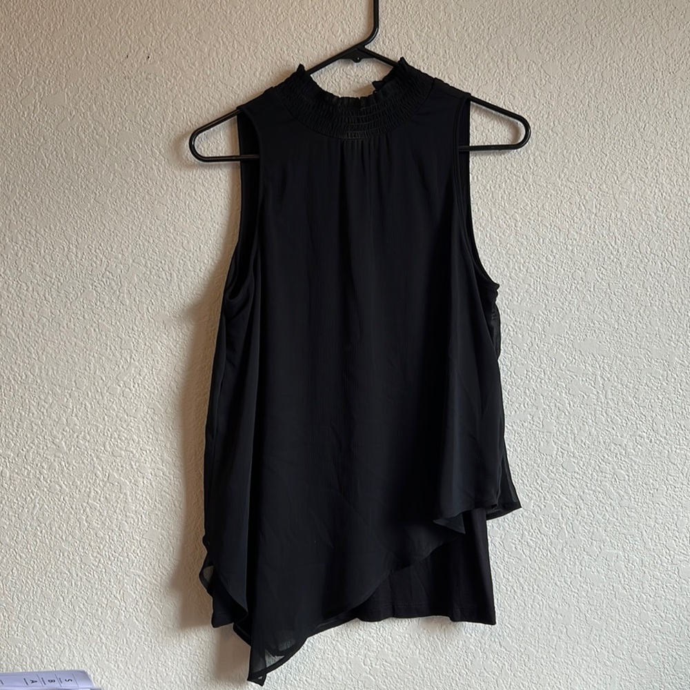Sleeveless black dress top